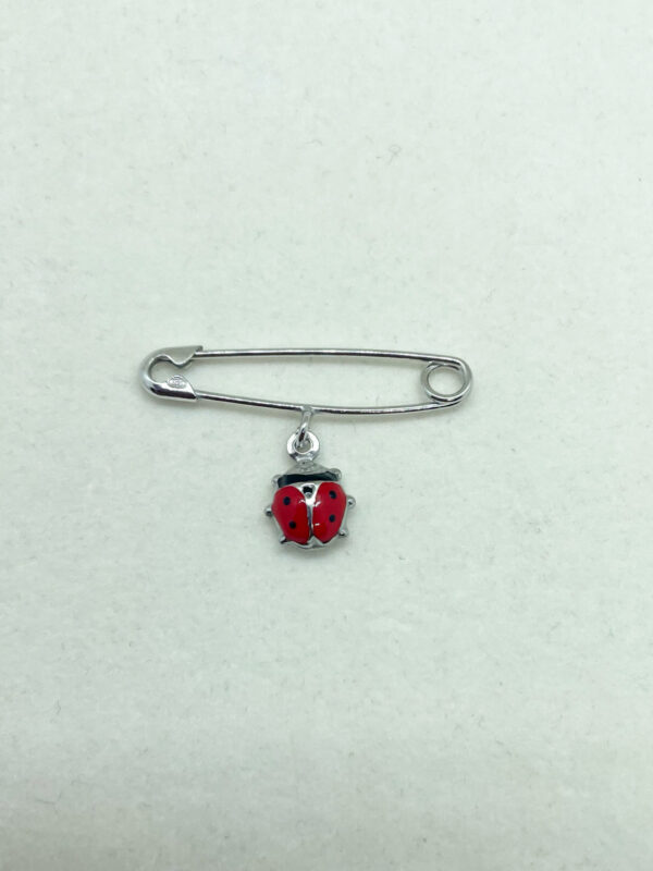 Spilla da balia bambino con pendente coccinella