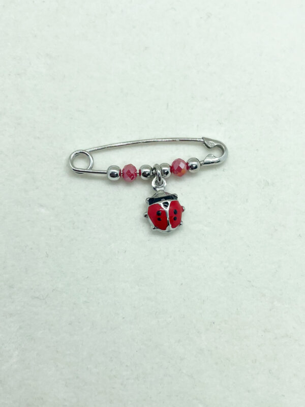 Spilla da balia bambino con pendente coccinella