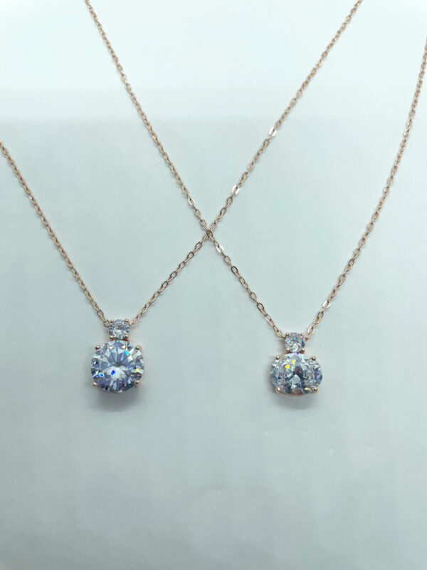 Collana pendente zircone bianco tondo e ovale