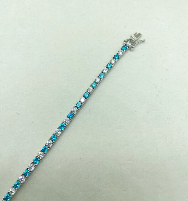 Bracciale tennis diametro 3mm con zirconi bianchi e acqua marina - immagine 3