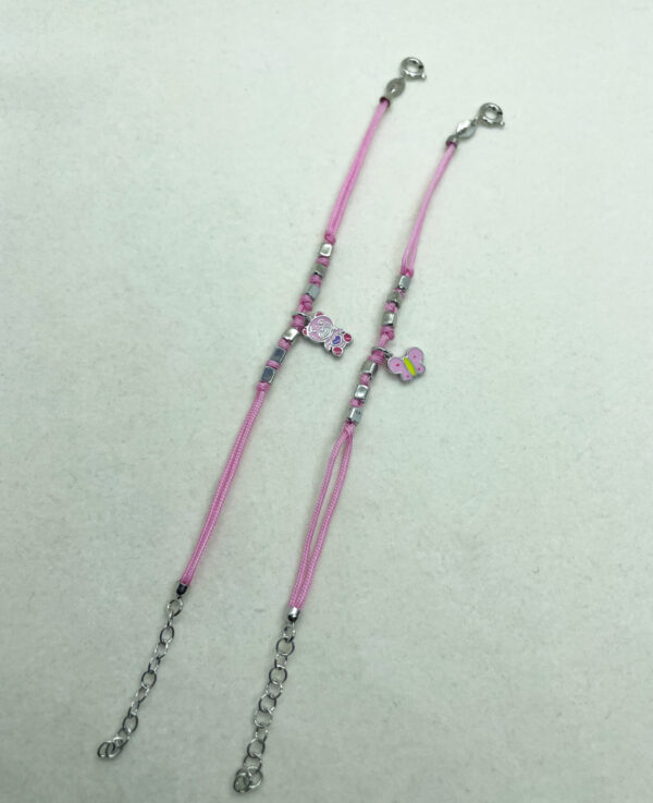 Bracciale bambino rosa cordino con pendente smaltato - immagine 3