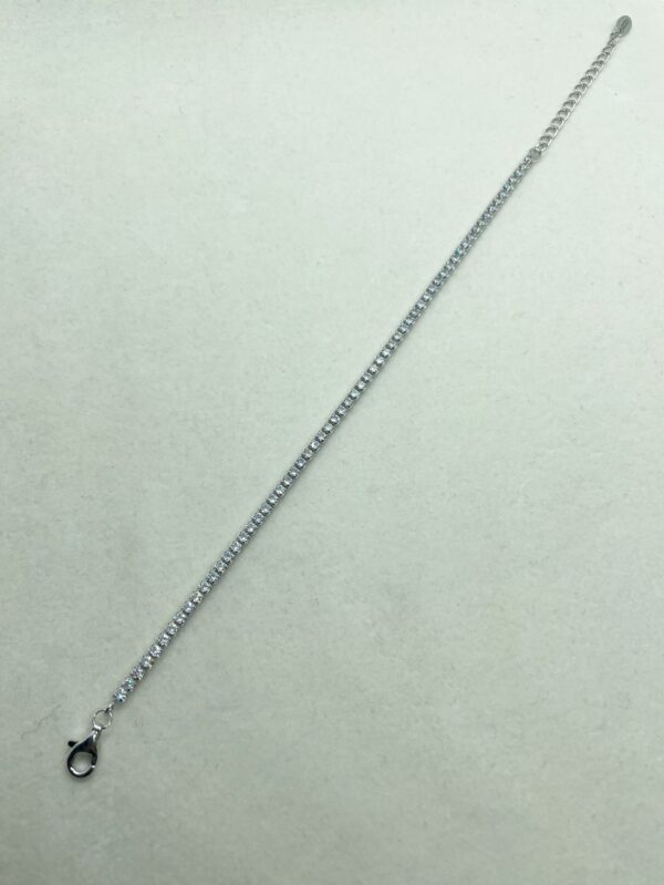 Bracciale tipo tennis con zirconi bianchi chiusura moschettone diametro 2mm